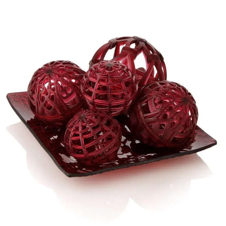 Red decorative balls on square plate